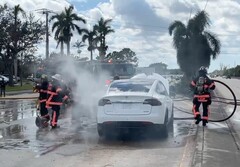 Burning EVs like the Tesla Model X seen in this picture can be tough to extinguish (Image: Jimmy Patronis)