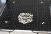 This must then be removed from the printing plate