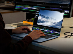 The Book Pro 14 has a slim and lightweight design. Pictured: a promo picture showing the laptop handling productivity workload.