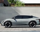 A Kia EV4 parked in front of a building (Image source: Hyundai Motor Group via Unsplash)