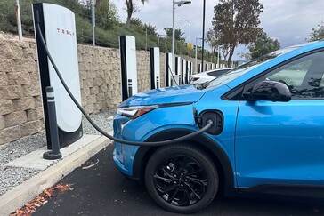 2027 Chevy Bolt EV at a Tesla Supercharger. (image source: GM Authority)