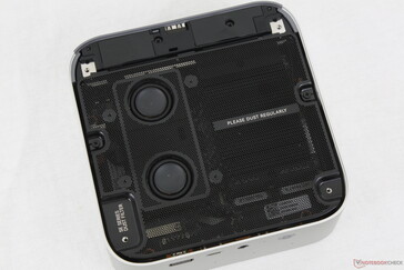 Removing the bottom panel reveals the internal stereo speakers