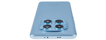 Top edge: microphone, IR blaster, speaker