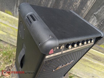 PU leather on top and sides, reinforced edges, and carry handle