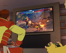 Superheroes Invincible and Rex Splode playing their corresponding characters in the upcoming Invincible VS fighting game.