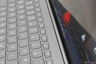 "Chin" bezel doesn't exist unlike on other laptops as the screen extends all the way down into the base of the unit