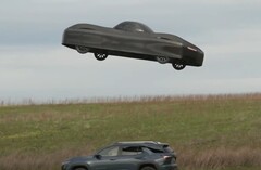 A screen grab shows Alef Aeronautics' electric Model A hovering above another car (Image source: NBC News on YouTube)
