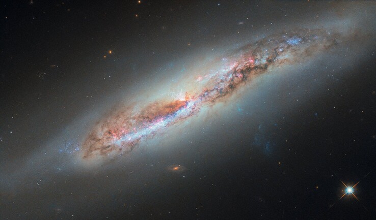 Hubble image of NBC 4388 (Image source: ESA/Hubble, NASA, S. Veilleux, J. Wang, and J. Greene)