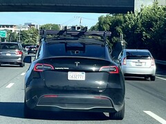 This particular Tesla Model Y has a roof-mounted LiDAR unit, suggesting it is being used to test Tesla's upcoming robotaxi. (Image source: Steve Krawczyk/The Verge)