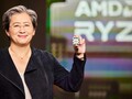 AMD CEO Dr. Lisa Su shows off the upcoming Zen 4 Raphael processor at CES 2022. (Image Source: AMD)