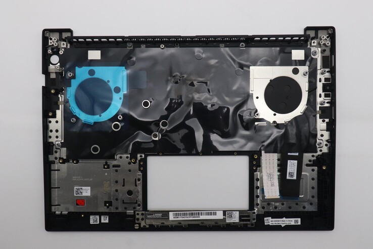 Keyboard cover of the P14s Gen 6 Intel, showing off the small black rivets that hold the keyboard in place (image source: Lenovo)