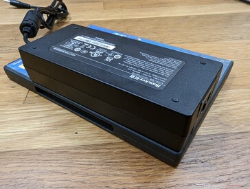 Small-medium (14.5 x 6.3 x 3 cm) 120 W AC adapter