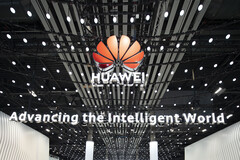 Huawei is intensifying efforts to stay on par with TSMC and others. Pictured - company logo snapped at an event (image source: Huawei)
