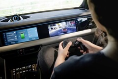 Gaming in the new 2026 Porsche Macan Electric SUV (Image source: Porsche)