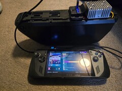 An ASUS ROG Ally X connected to a large eBike battery using a DIY voltage step-down converter, demonstrating a successful extended power mod. (Image source: DoggoLord27 via r/ROGAlly)