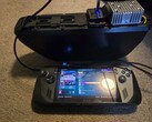 An ASUS ROG Ally X connected to a large eBike battery using a DIY voltage step-down converter, demonstrating a successful extended power mod. (Image source: DoggoLord27 via r/ROGAlly)