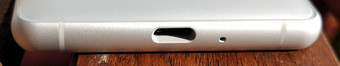 Bottom: USB Type-C port, microphone
