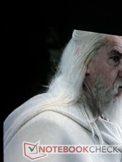 Details in sharp contrast boundaries (such as Gandalf's hair) remain clear.