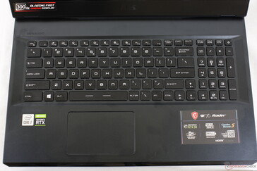 QWERTY layout with full-size arrow keys. All keys and symbols are lit when the backlight is active