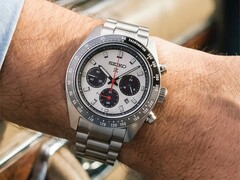 The Prospex Speedtimer Solar HBJ001 with a silver dial and black subdials worn on a wrist, featuring a black tachymeter bezel and stainless steel bracelet.