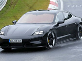 The new Porsche Taycan EV looks sharp in Nürburgring testing spy shots thanks to updated graphics and redesigned headlights. (Image source: Auto Express)