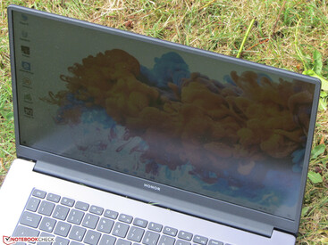 The MagicBook 15 outdoors.