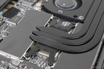 Soldered LPDDR5 modules are underneath the aluminum cover adjacent to the CPU