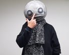 A picture of Nier's creator Yoko Taro wearing his mask