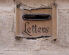 Stone letter slot with the word Letters carved into a wall