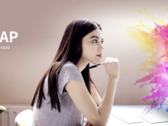 eLEAP can offer more cost-efficient and overall-improved displays. Promo image displaying an impressed person. (Image source: JDI) 