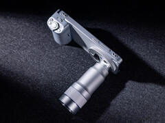 The Vivo X300 Ultra with its camera accessories attached.