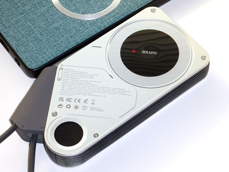 Charging pad and mesh-covered vent on back.