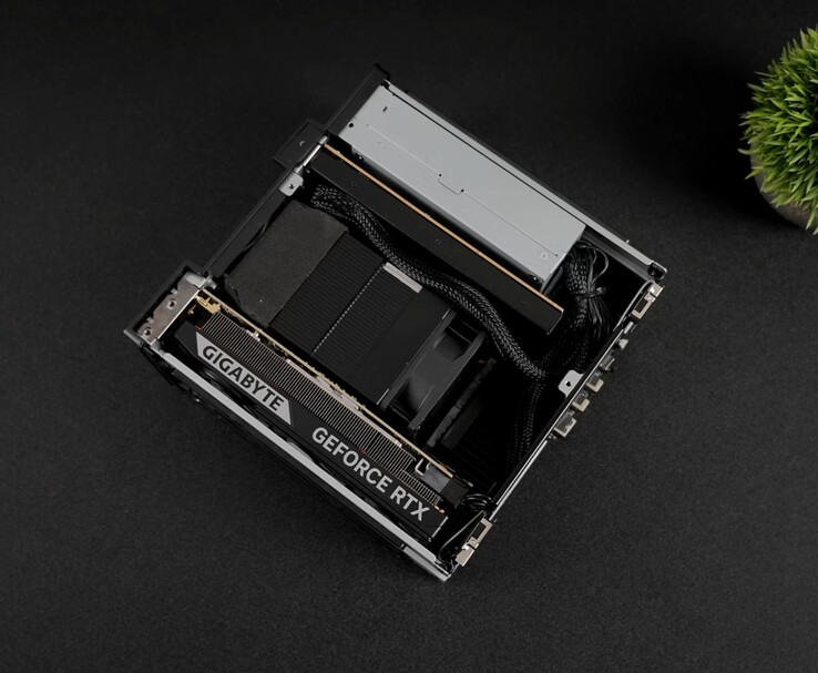 Internal view of the Minisforum MS-02 Ultra showing the installed Gigabyte GeForce RTX low-profile GPU (Image source: YouTube/ETA Prime)