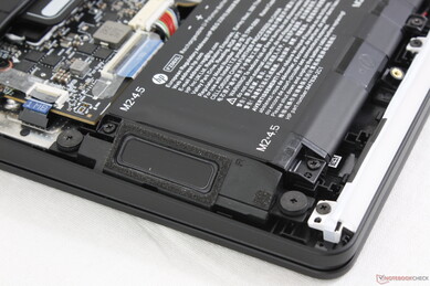 Down-firing stereo speakers near the front corners