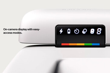 A digital display behind the flip-up flash allows users to check camera status and remaining film count. (Image source: Polaroid)