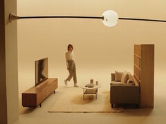 A lamp moving through the living room on ceiling-mounted rails (image source: product video screenshot)
