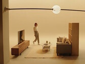 A lamp moving through the living room on ceiling-mounted rails (image source: product video screenshot)