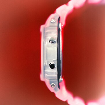 Side view of the Casio G-Shock DW-5600TNT-7 showing its translucent case and metal pushers.