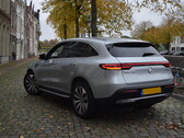 Mercedes EV parks on a street