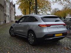 Mercedes EV parks on a street