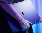 The Alienware Aurora 16X gaming laptop, pictured in the hands of a person. (Image source: Alienware)
