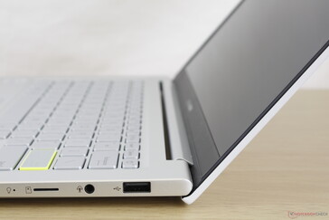 Lid opened to maximum angle (~140 degrees)