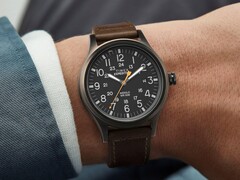 Timex Expedition Scout-40mm-TW4B260009J with a black dial and brown leather strap worn on a wrist