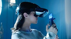 Lenovo confirms the lightsaber is not a prop. It has working mechanical buttons and it's tracked by the headset. (Source: Disney)