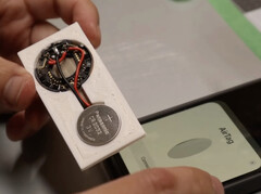 A modder has converted an Apple AirTag so it fits a wallet. (Image: 9to5Mac)