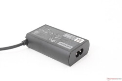 Small (~7.5 x 4.7 x 2.2 cm) 65 W USB-C AC adapter