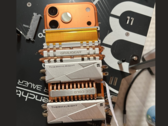 iPhone 17 Pro Max with SSD coolers attached for better thermal stability (Image source: u/T-K-Tronix via r/iphone)