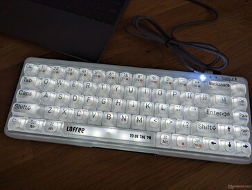 White backlight on. Note that the printing on the keys is opaque