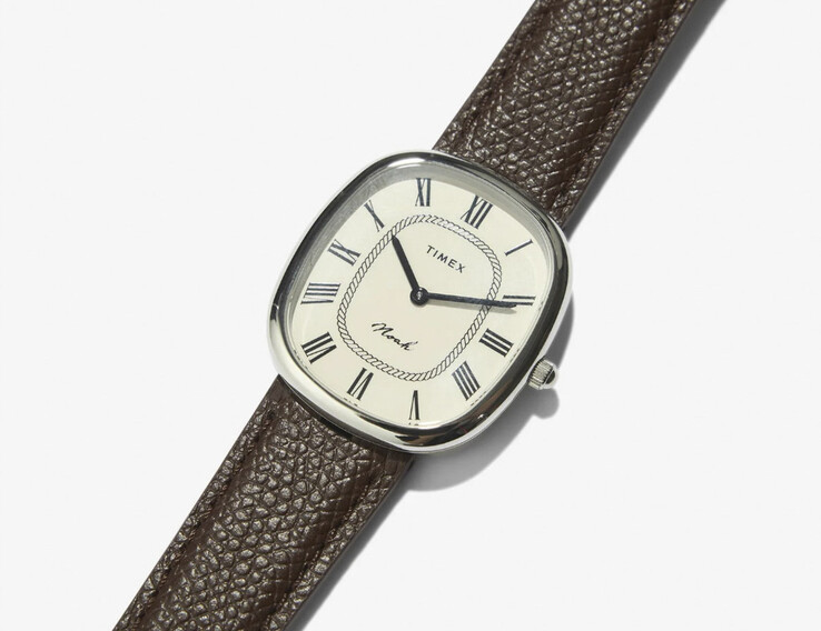 The stainless-steel Noah × Timex Boatswain features an elliptical case, cream Roman numeral dial and textured brown leather strap.