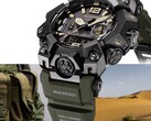 Close-up of the Casio G-Shock Mudmaster GWG-B1000-1A3 showing its black case, tan dial accents, olive green band, rugged protective guards, and Triple Sensor labeling, set against military gear and a desert landscape.
